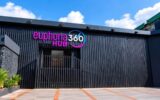 Euphoria 360 Hub’s exterior, with its pink and white sign above the entrance.