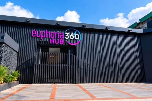 Euphoria 360 Hub’s exterior, with its pink and white sign above the entrance.